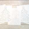 Printed Christmas tree and presents  drawing on white paper.